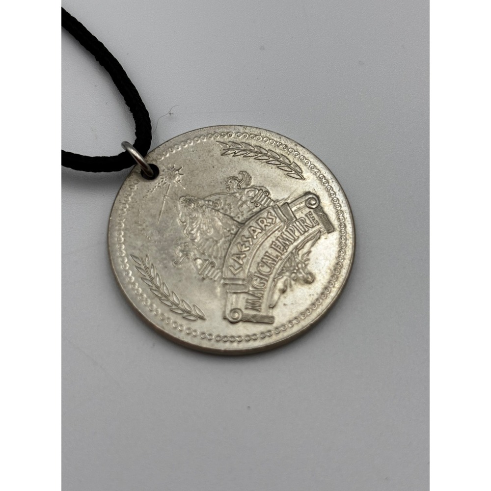 Caesars Magical Empire Las Vegas Medallion Necklace Silver Tone Souvenir Coin